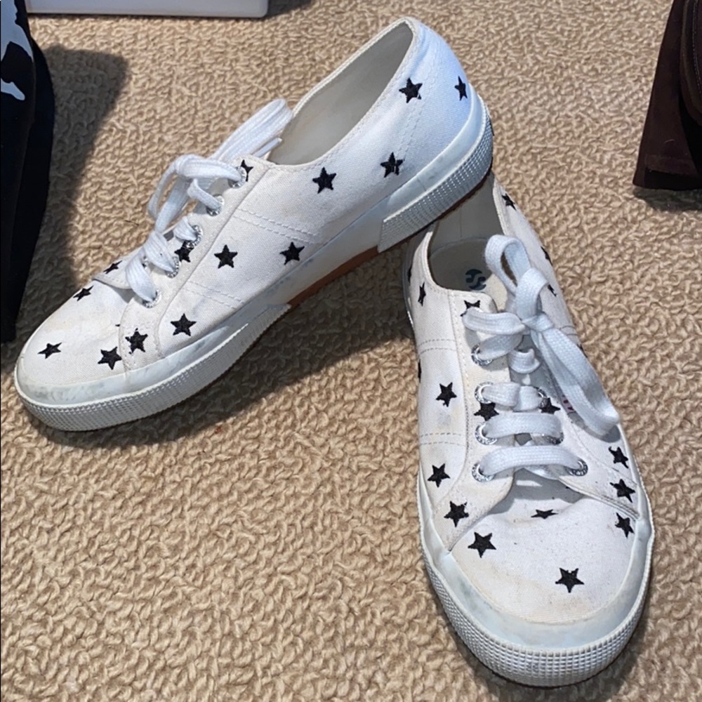 Minimally worn white Superga’s with black stars